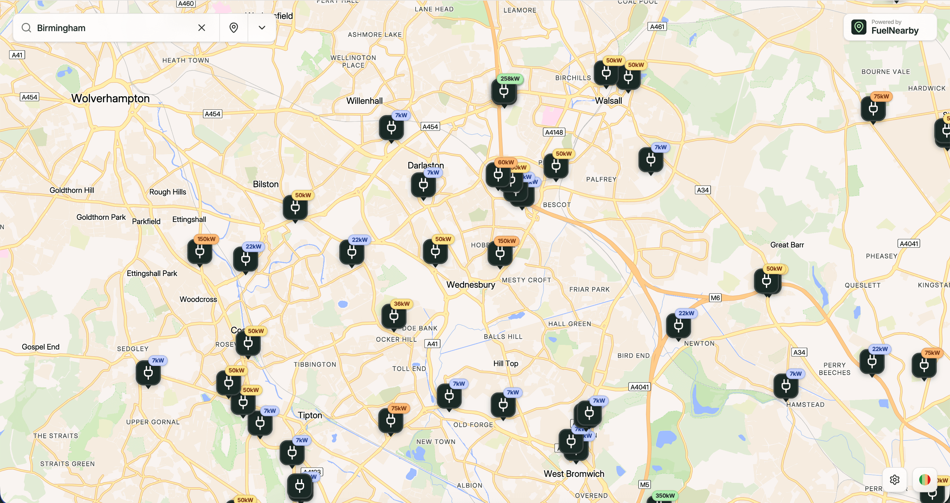 FuelNearby map showing EV charging stations around the West Midlands with colour-coded kW speed labels on each pin